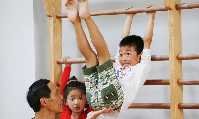 Giấc mơ vô địch Olympic của những đứa trẻ ở lò đào tạo thể thao Trung Quốc: Đánh đổi tuổi thơ bằng máu, mồ hôi và nước mắt - Ảnh 14.