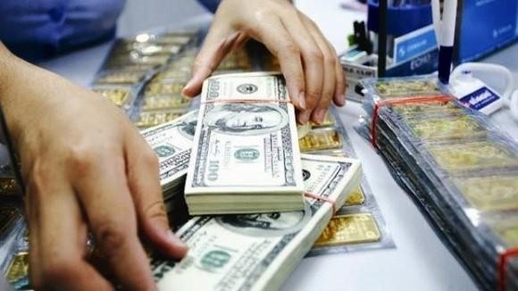 Giá vàng, USD giảm mạnh - Ảnh 1.